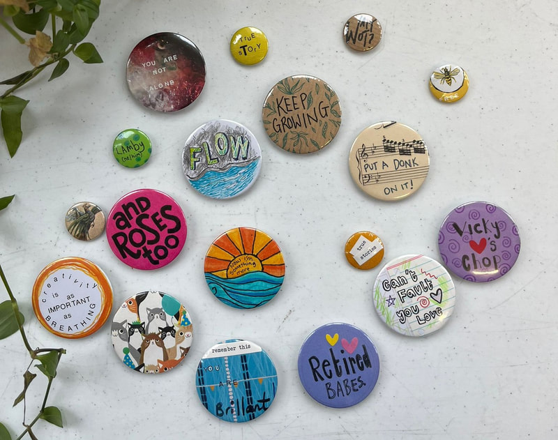 Collection of colourful, handmade button badges