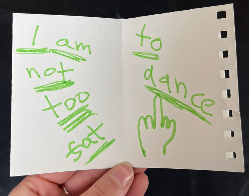 Handwritten note saying 'I am not too fat to dance'